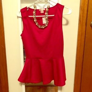 Red blouse with necklace